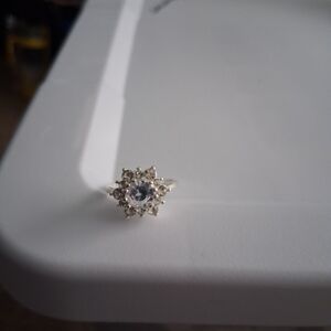 Elegant Silver Tone Ring with Clear Gemstone